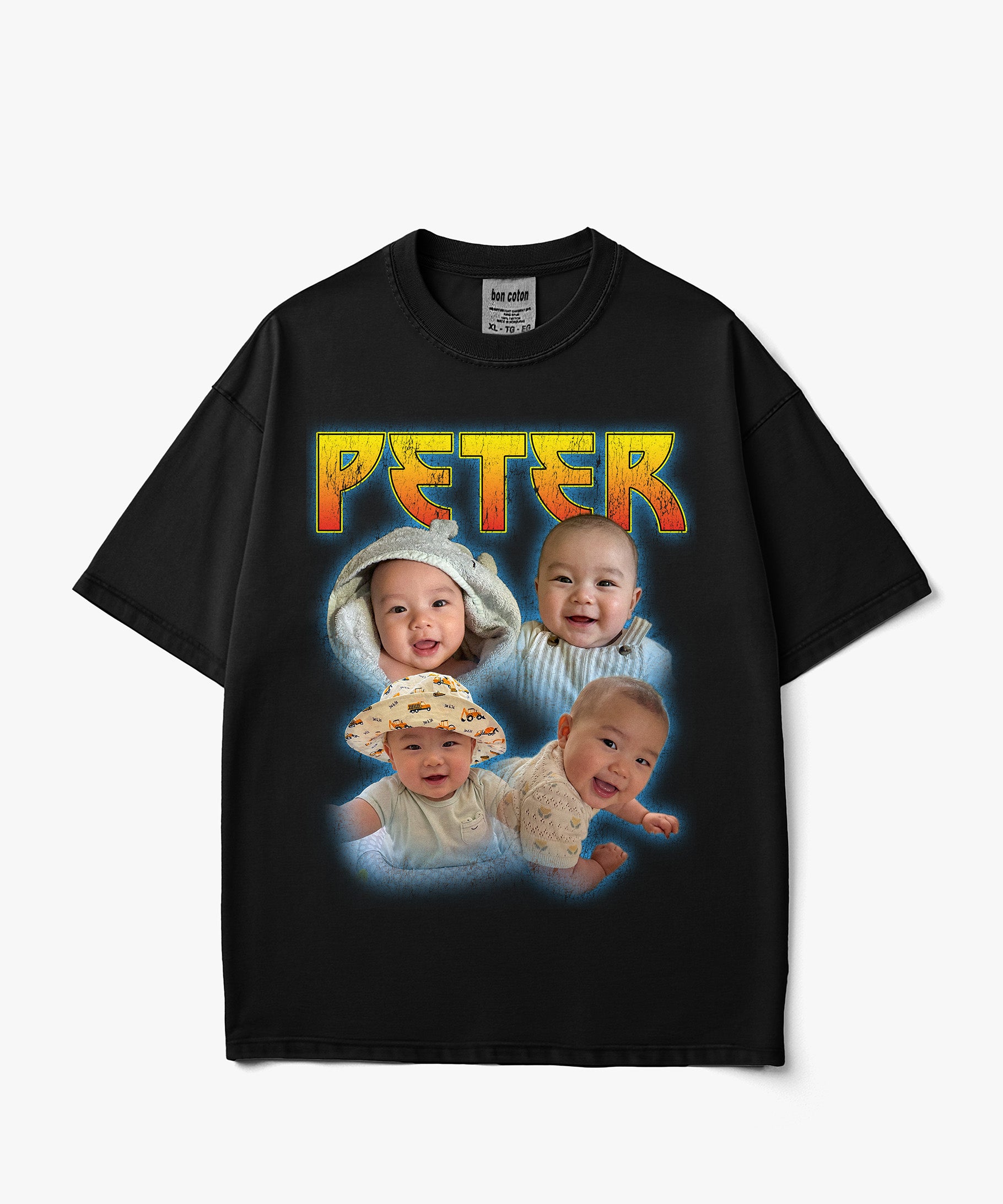 Image of A black short-sleeve custom bootleg graphic t-shirt featuring the name 'PETER' in a yellow and orange gradient font above a collage of four baby photos with a blue glow effect, displayed on a light gray background.