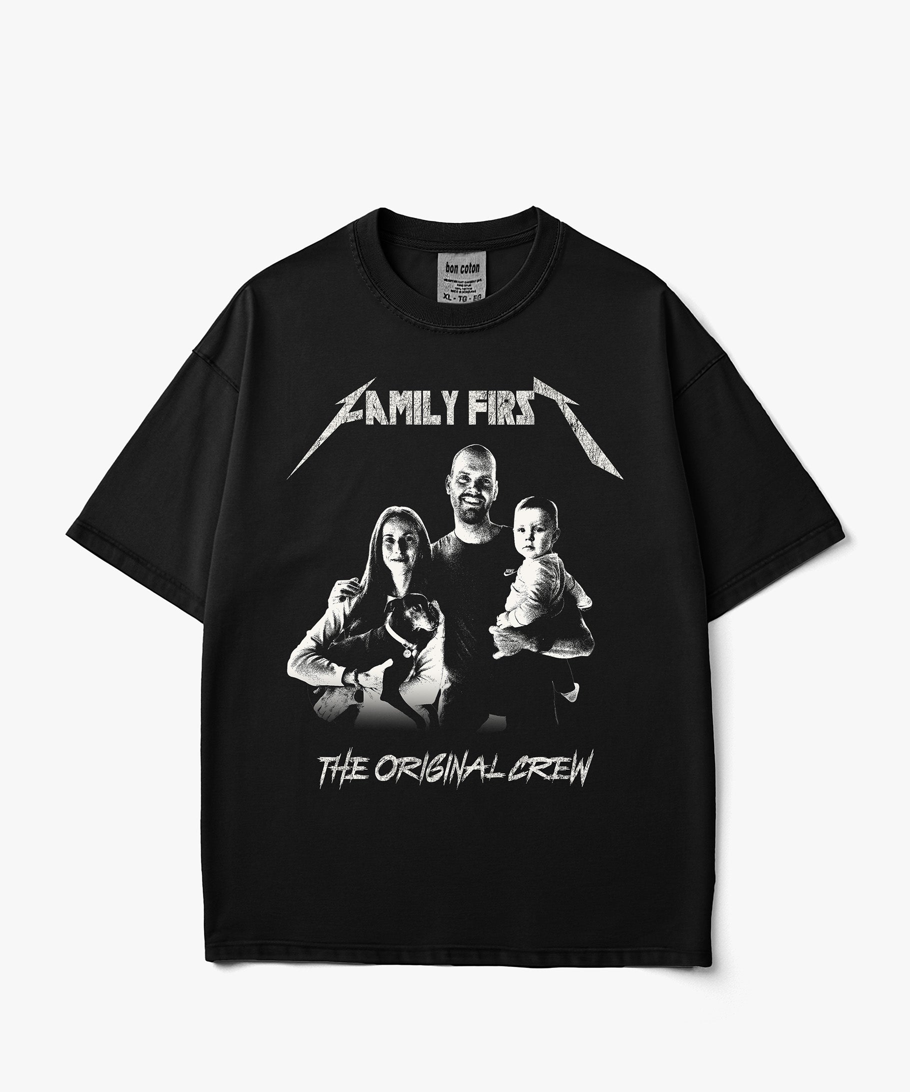 Image of A black short-sleeve custom bootleg graphic t-shirt featuring a white and gray print of the band Metallica's 'Family First' album art, including the band's name in a stylized font and the text 'The Original Crew' at the bottom, displayed on a clean white background.