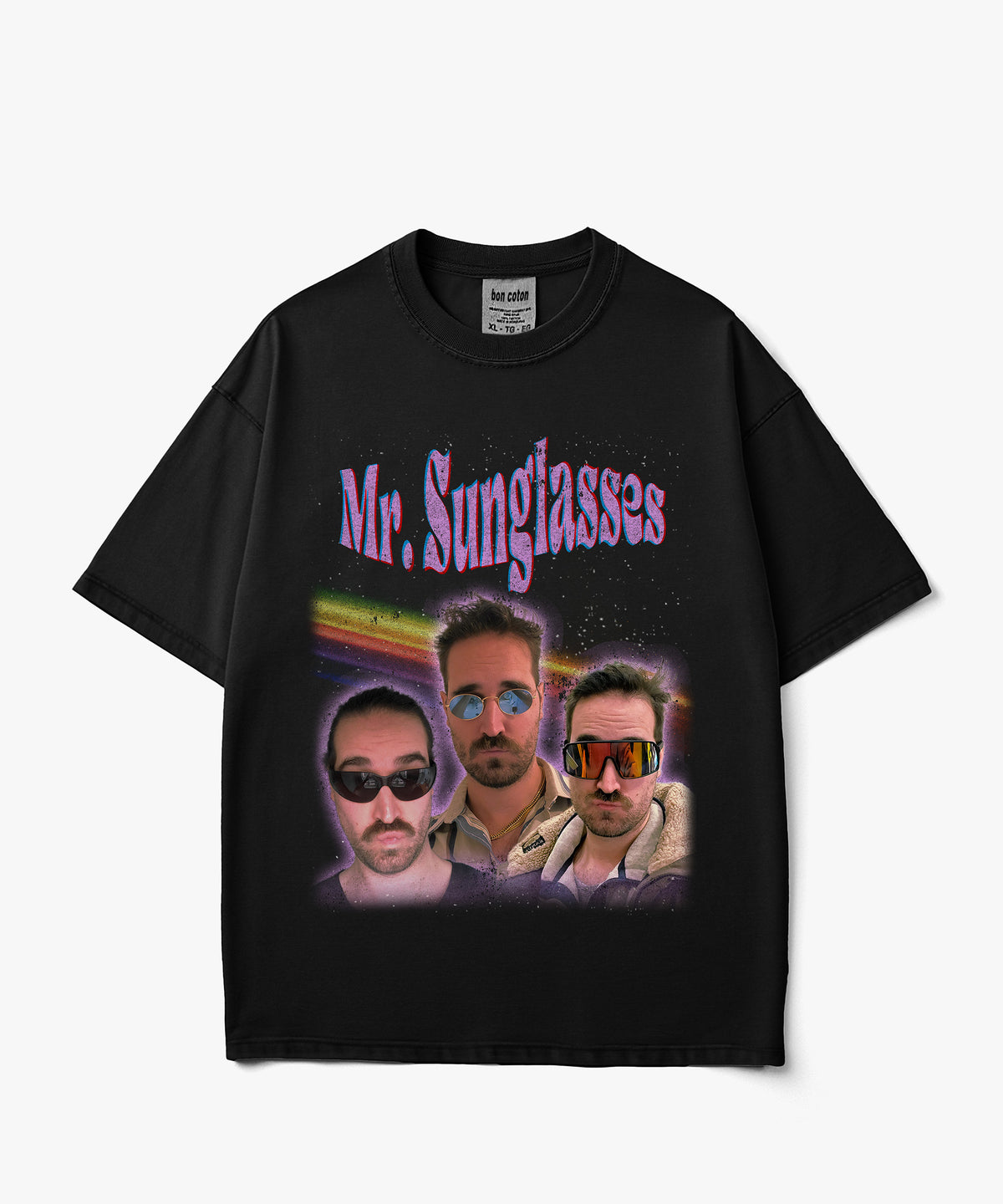 A black short-sleeve graphic t-shirt featuring the text 'Mr. Sunglasses' in purple above a colorful collage of three men wearing sunglasses, displayed against a light gray background.